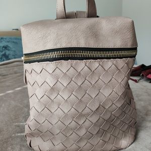 Madison West weave pleather backpack